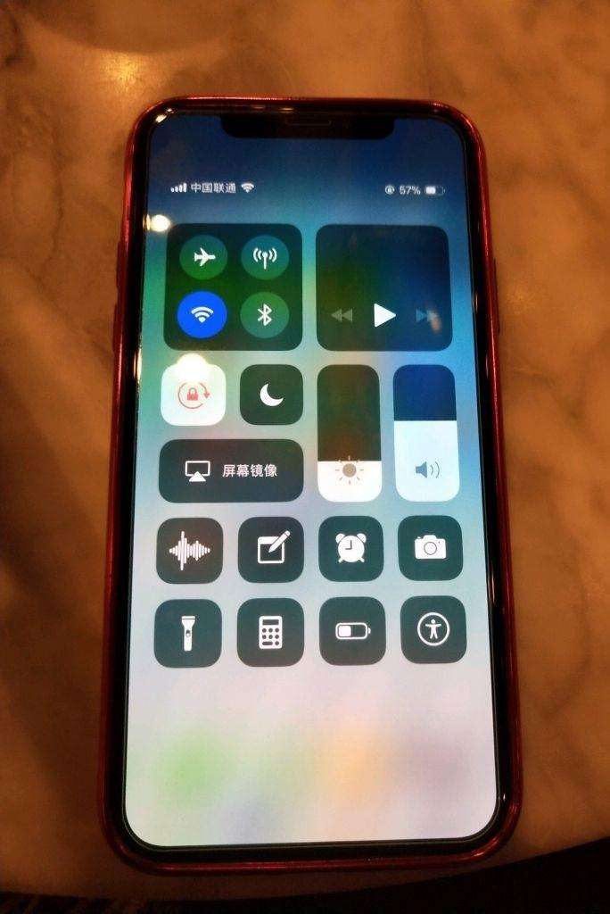 觉得iPhone X上的小白条太碍眼? 教你分分钟消灭它